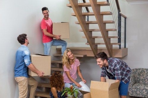 Careful loading of protected belongings into a moving vehicle